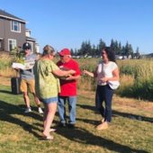 Councilmembers at a neighborhood gathering.