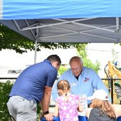 Councilmember Burkle visits with a community member at City Days.