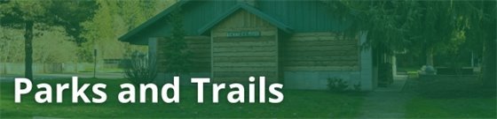 Bennett Hall at Abrams Park with dark green overlay and text 'Parks and Trails'.