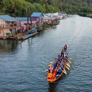 One of the Ridgefield dragon boats paddles down Lake River.