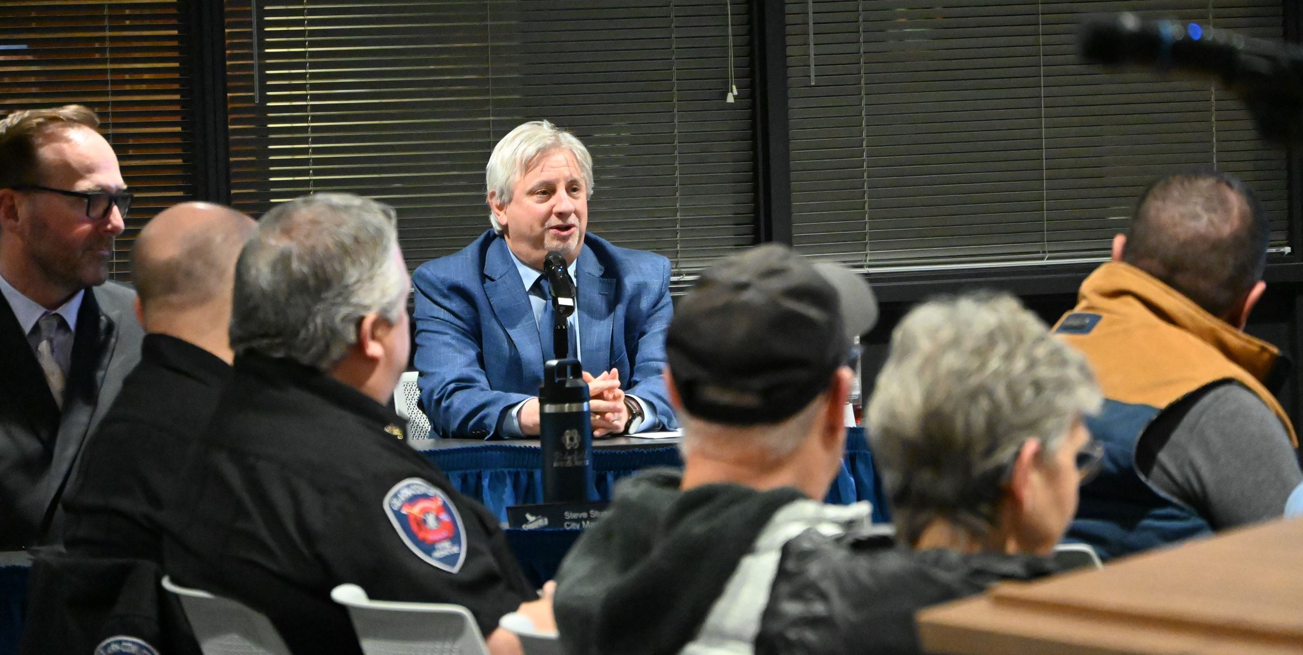 Chuck Green speaking during a City Council meeting.