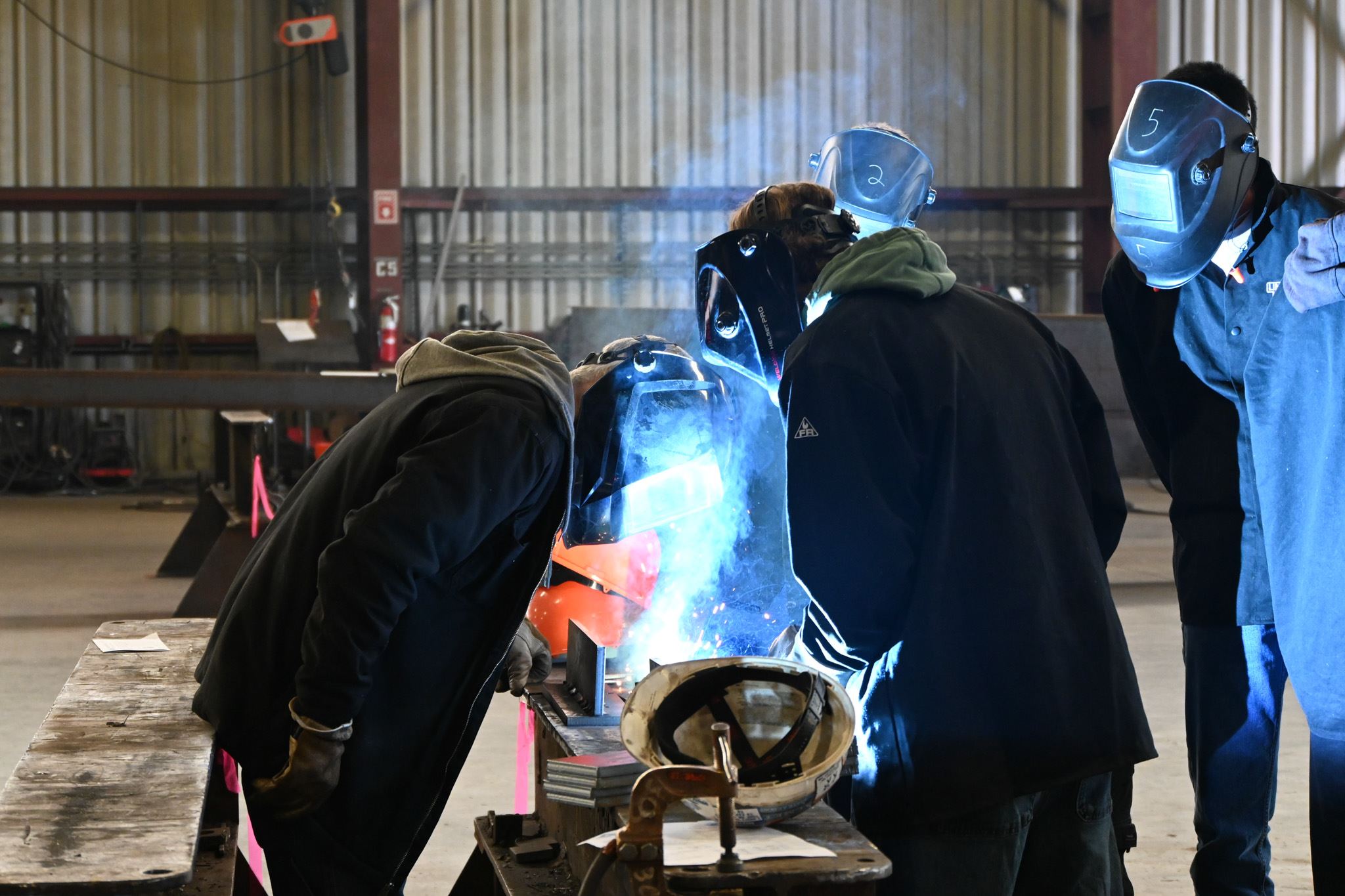 A student practices welding.
