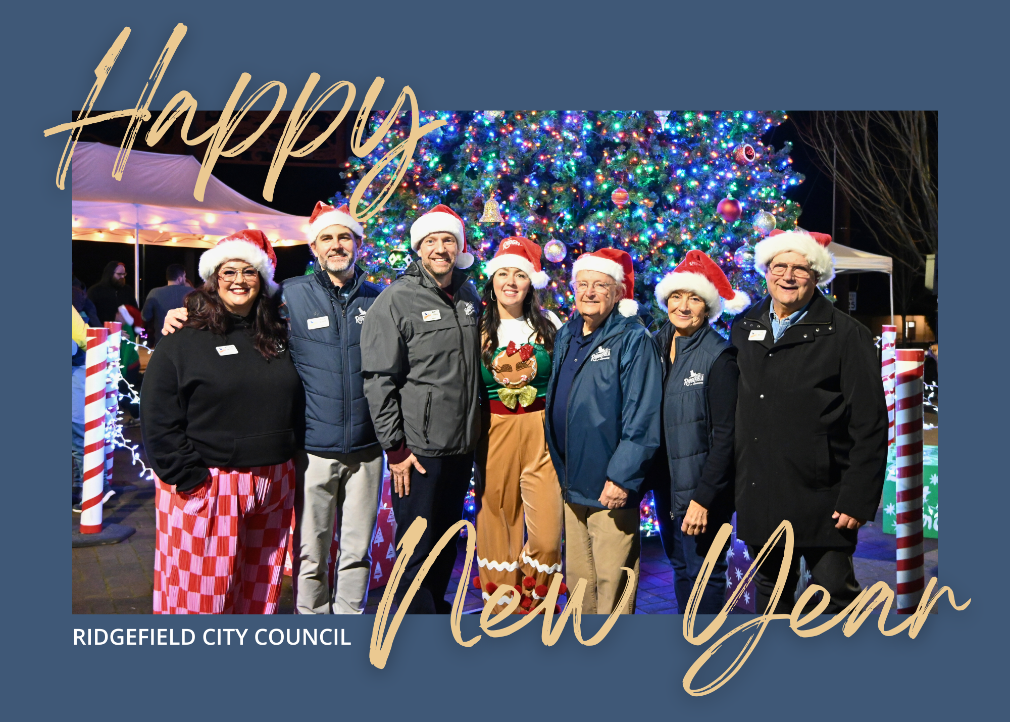 City Council group photo in front of the tree with text overlay 'Happy New Year.'